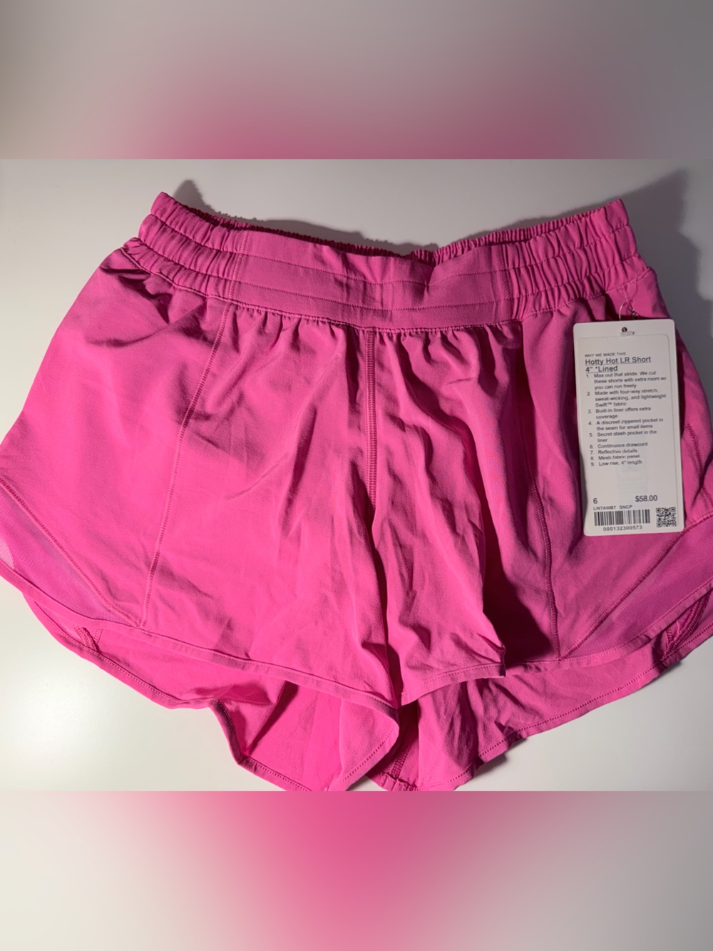 NWT lululemon hotty hot shorts 4” Sonic pink size 6